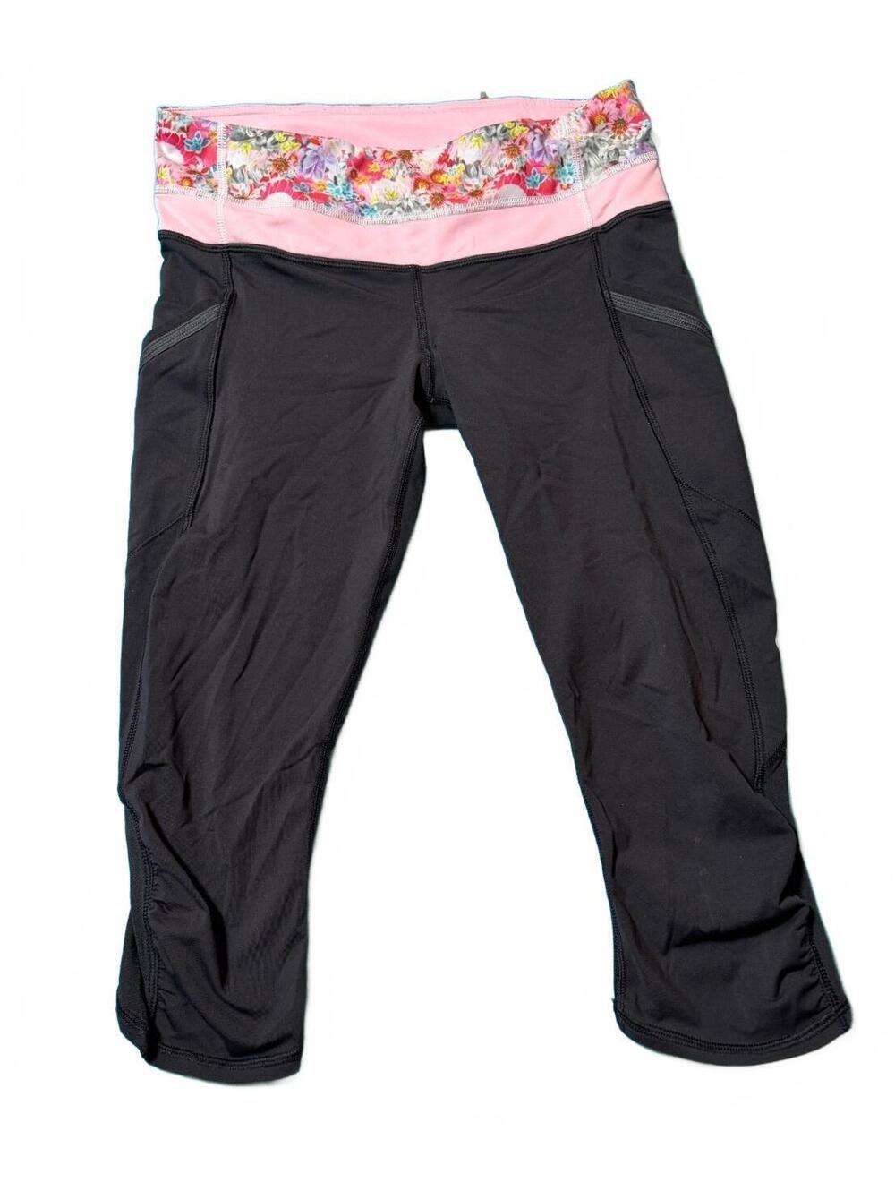 Lululemon Women's Black Capri Leggings with Pink Floral Waistband Size 6